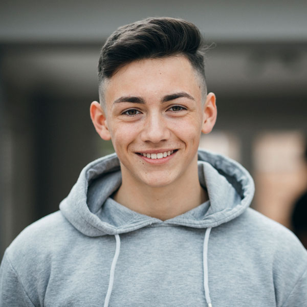 teenage boy smiling