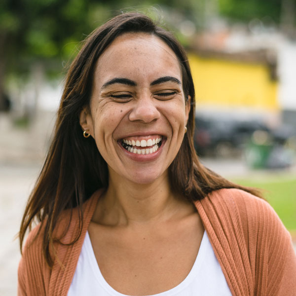 woman smiling outdoors